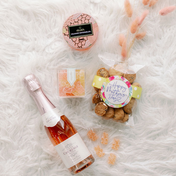 Champagne, Voluspa, and snacks Mother's Day gift box