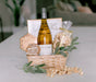 The Basketry a wine celebration wine and gourmet snack gift basket