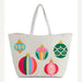 Canvas tote bag by Draper James featuring five vibrant holiday ornaments with gold sequined caps including a multi-colored striped bauble and a pink starburst teardrop ornament against a white background