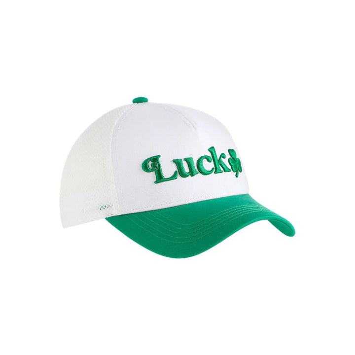 Studio photograph of a white and green trucker hat featuring green embroidered Lucky text with a small four-leaf clover icon and a white mesh back against a plain white background
