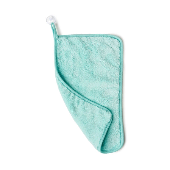 Studio photograph of a mint green microfiber cloth hanging from a white suction cup against a plain white background featuring a soft plush texture, a reinforced stitched border, and a small hanging loop