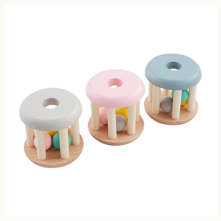 Wooden baby rattle set featuring three cylindrical cage toys with pastel grey pink and blue tops containing colorful internal rolling beads on a plain white background