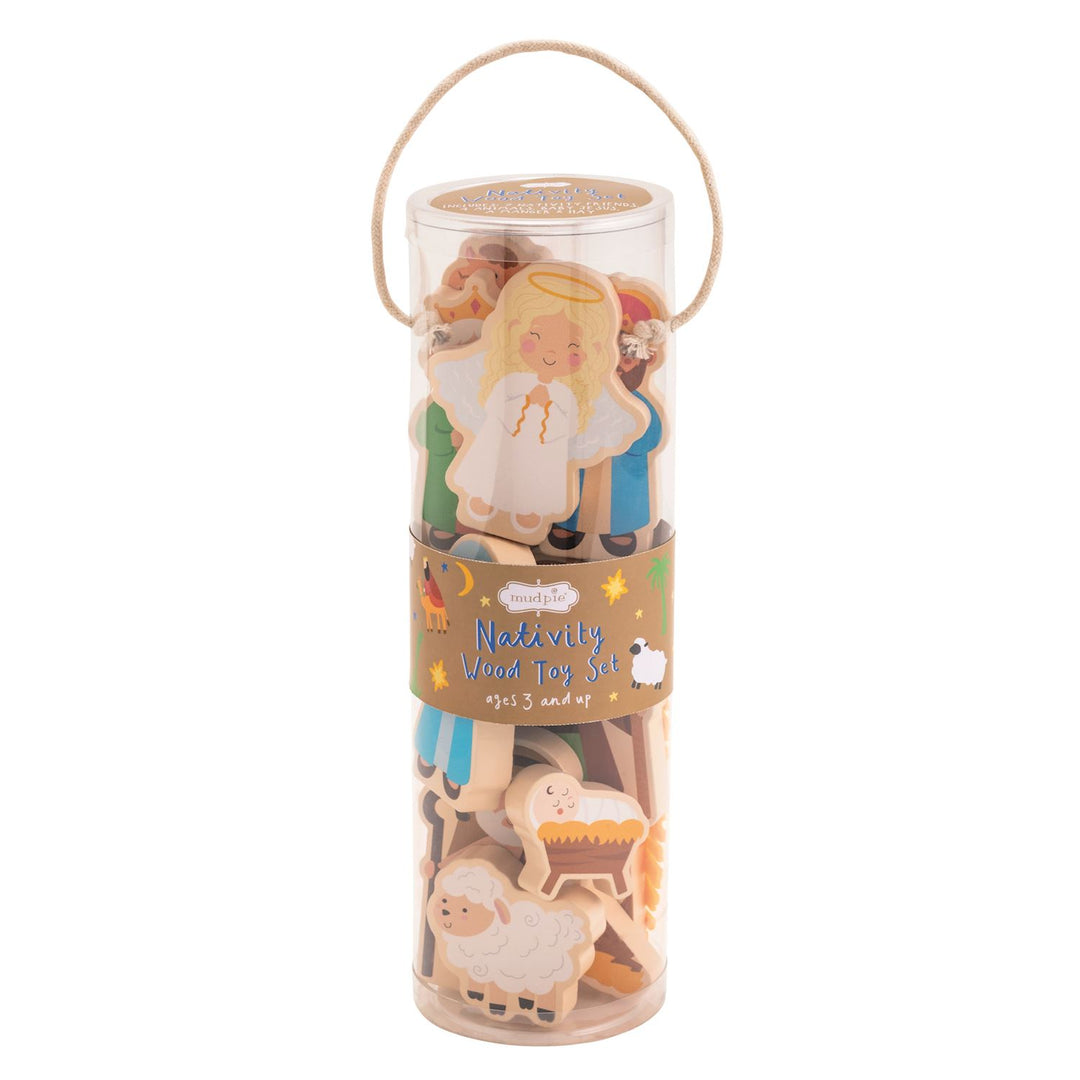 Clear tube of painted wooden nativity figures with a Mud Pie Nativity Wood Toy Set band and rope handle
