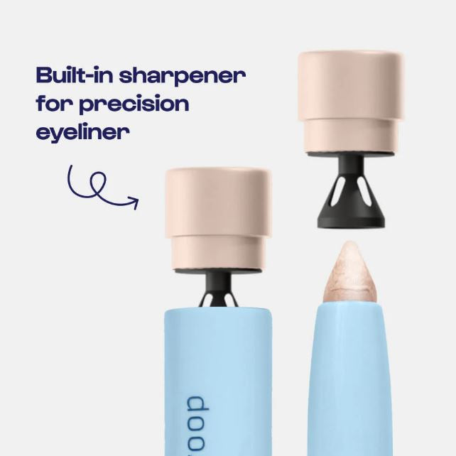 Product advertisement graphic of a light blue eyeliner pencil with a shimmering champagne-colored tip featuring a tan cap with an integrated black conical sharpener and dark blue instructional text against a minimalist studio background