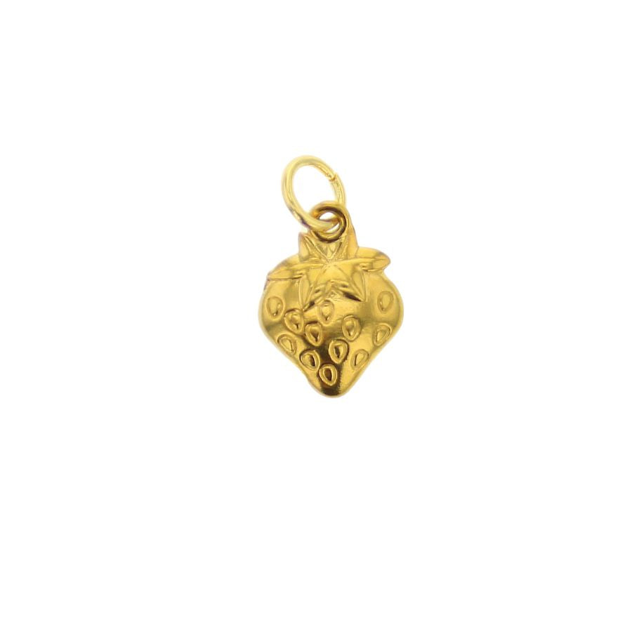 Gold jewelry charm of a strawberry centered on a white background featuring realistic indented seeds and a polished five-point leafy cap with a small round jump ring