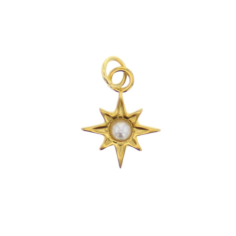 Yellow gold jewelry starburst charm featuring a central round white pearl and eight tapered rays with engraved detailing against a plain white background