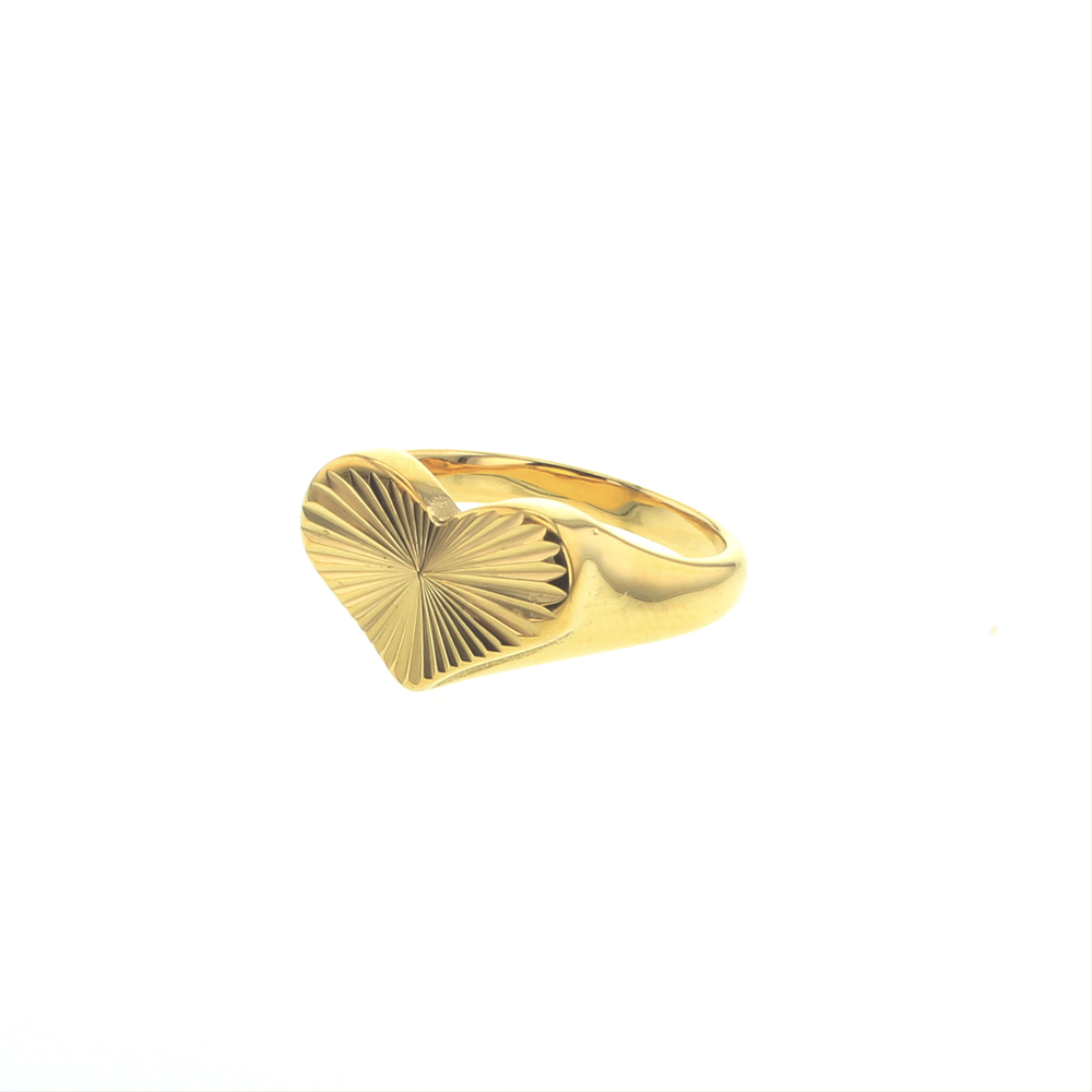 Gold heart signet ring featuring a radiant sunray engraving and a high-polish finish on a minimalist white background