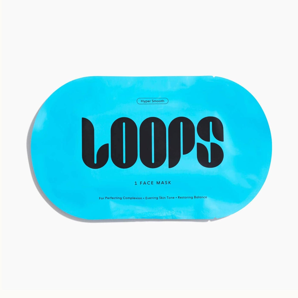 Commercial product photograph by Loops Beauty of a vibrant turquoise Hyper Smooth face mask packet in a minimalist oval shape featuring bold black LOOPS typography and descriptive text for perfecting complexion on a clean white background