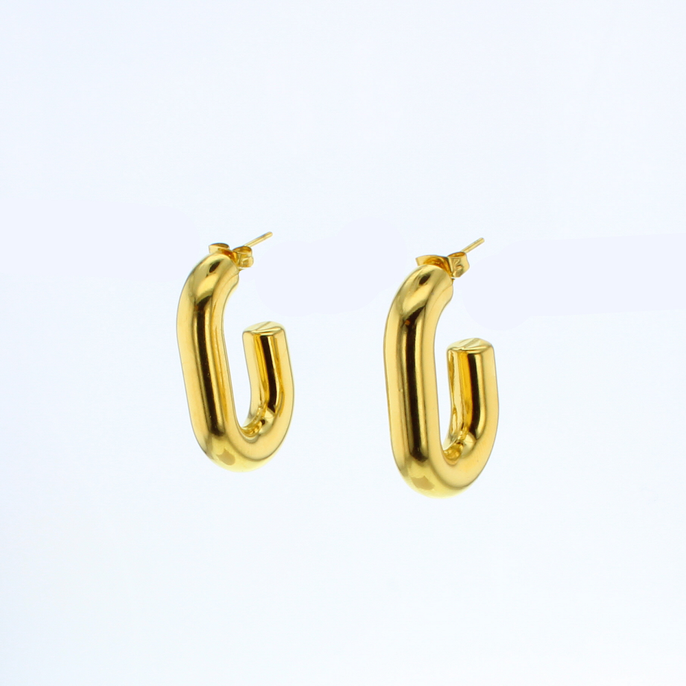 Gold jewelry pair of chunky oval-shaped hoop earrings displayed on a plain white background featuring a reflective high-shine finish and secure butterfly post backs