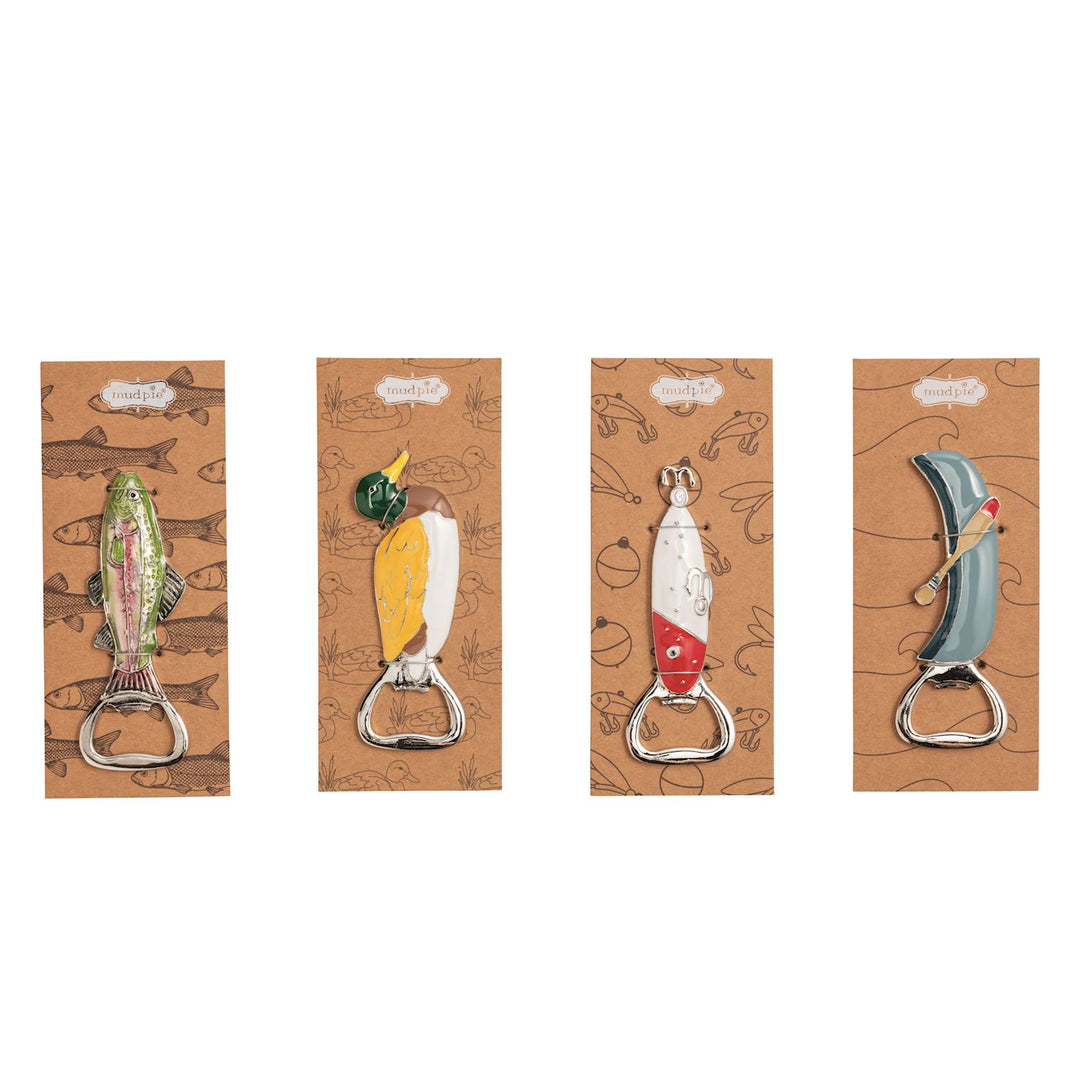 Enamel and metal bottle openers by Mud Pie featuring outdoor-themed designs of a shimmering green trout, a yellow mallard duck, a red-and-white fishing lure, and a blue canoe with a wooden oar displayed on decorative brown cardstock packaging