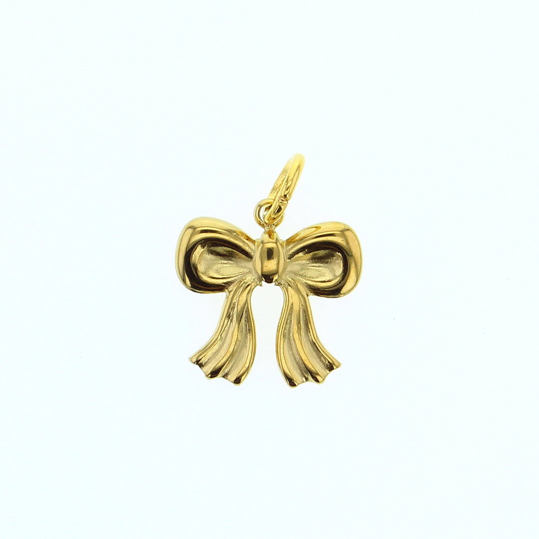 Yellow gold bow-shaped jewelry pendant featuring a polished central knot and pleated flared ribbon tails against a minimalist white background