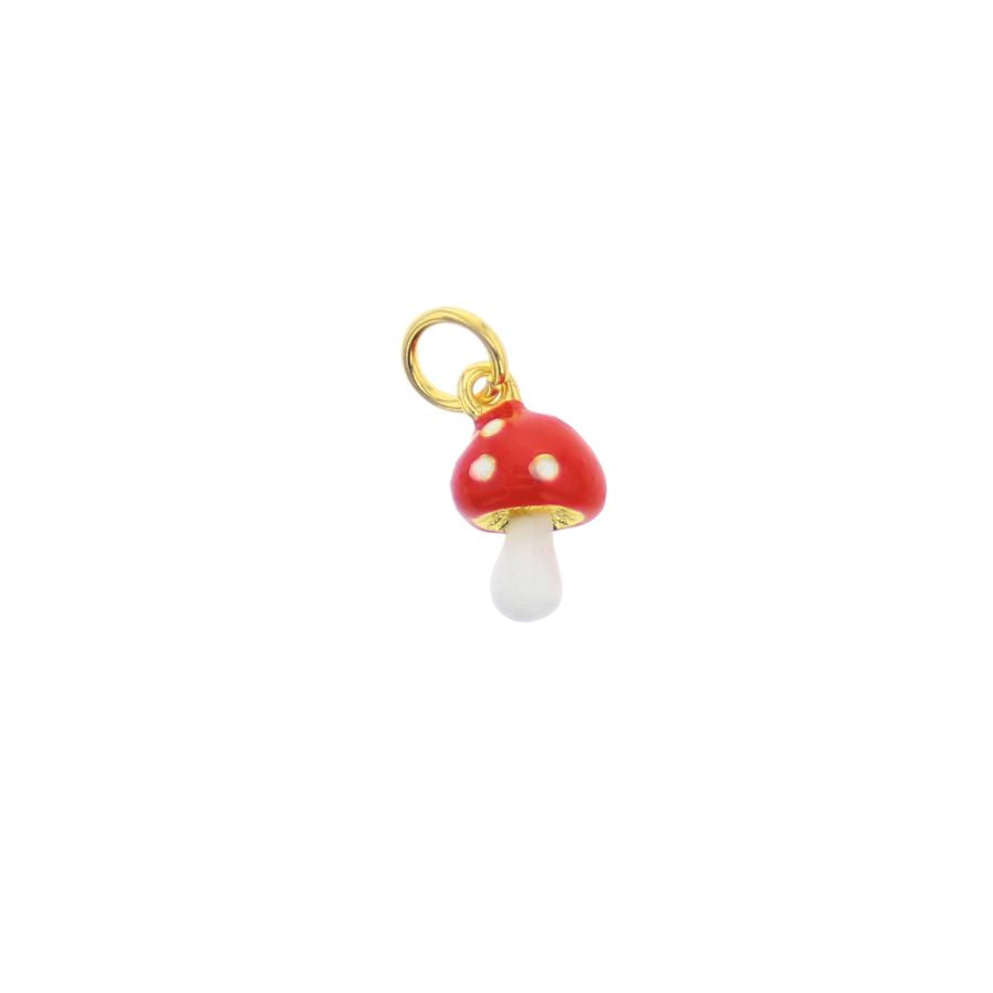 Gold-plated enamel jewelry mushroom charm centered on a white background featuring a glossy red cap with white polka dots and a polished gold jump ring