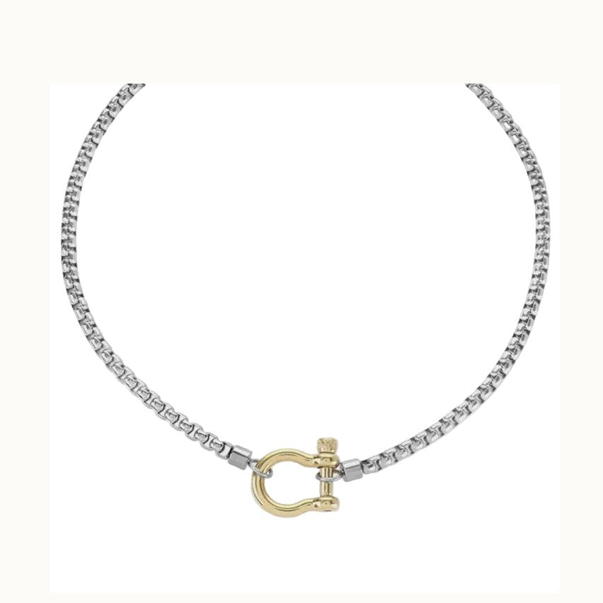 Jewelry necklace featuring a polished silver-toned box chain and a contrasting yellow gold shackle clasp with a textured screw-pin closure set against a plain white background