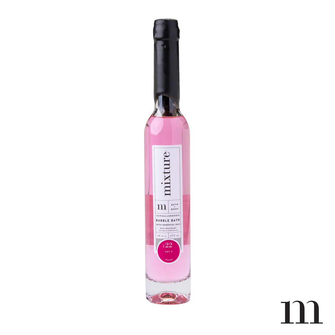 Mixture bubble bath bottle with hot pink liquid and a black wax top