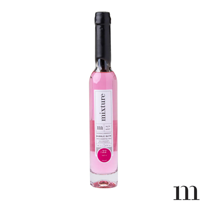 Mixture bubble bath bottle with hot pink liquid and a black wax top