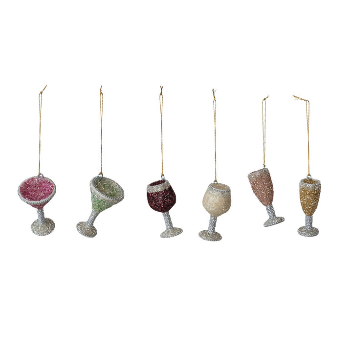 Beaded glass ornaments of six festive cocktail and wine glass charms displayed against a neutral white background featuring vibrant seed beads, intricate silver-pearl stems, and delicate gold hanging cords