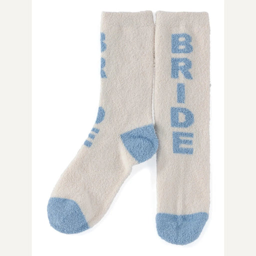 Beige socks with blue accents and 'BRIDE' text on a white background
