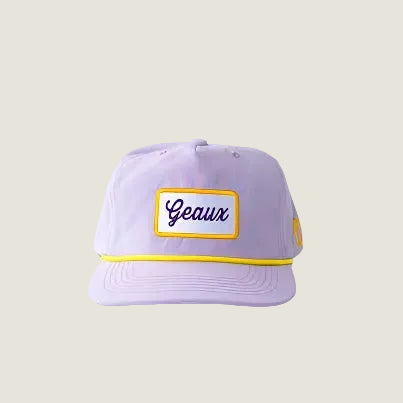 Front view of a lavender rope hat with a Geaux script patch and yellow cord