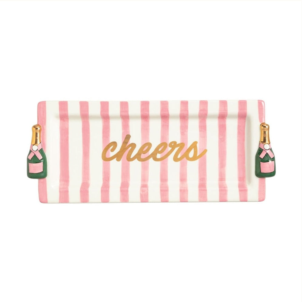 Ceramic tray by Mud Pie featuring a rectangular serving platter with vertical pink and white stripes, a central gold script reading cheers, and iconic green champagne bottle handles with gold accents