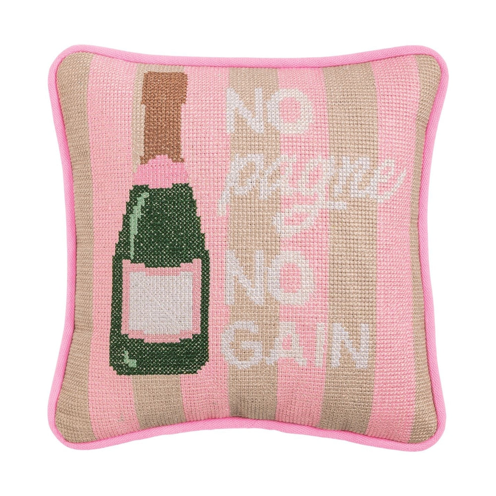 Needlepoint decorative throw pillow featuring a green champagne bottle with a pink foil neck and the pun NO pagne NO GAIN on a pink and tan striped background with pink piping