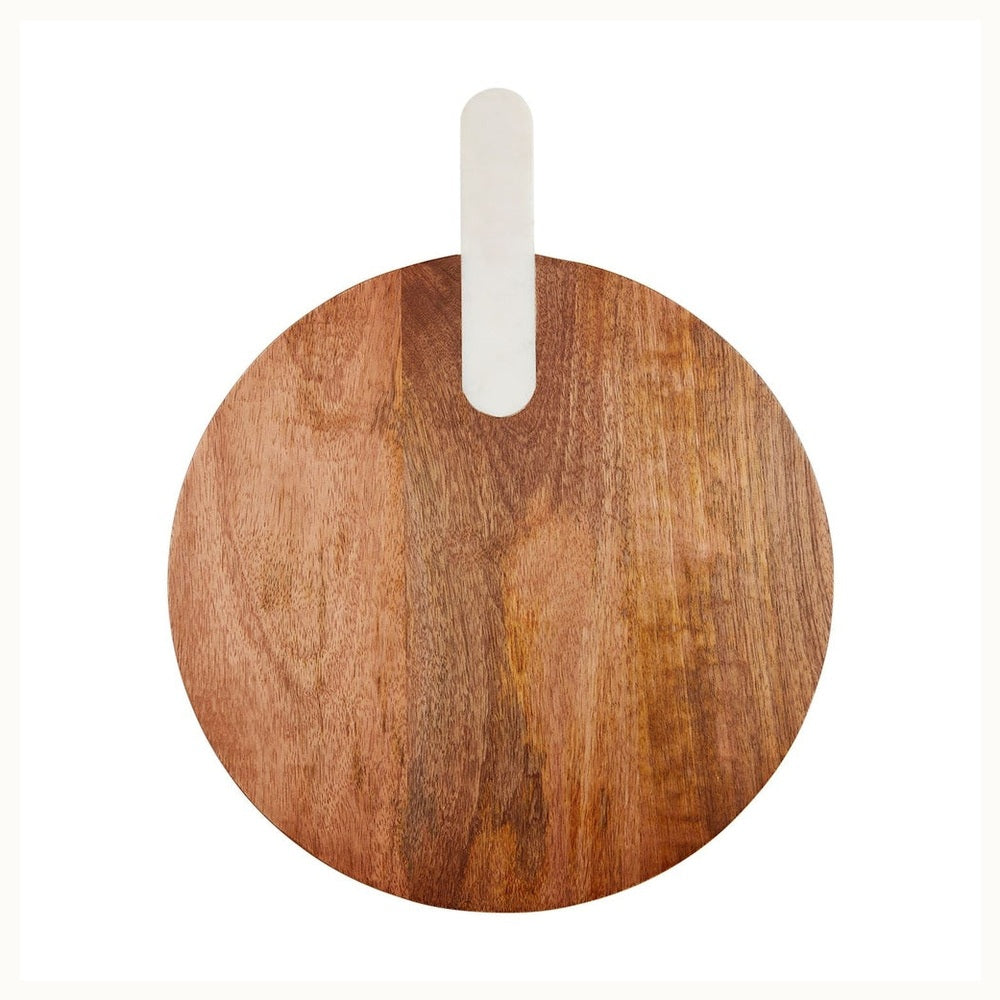 Wood and marble circular serving board featuring a reddish-brown acacia base with natural vertical grain, a polished white marble handle insert, and a minimalist silhouette against a plain white background