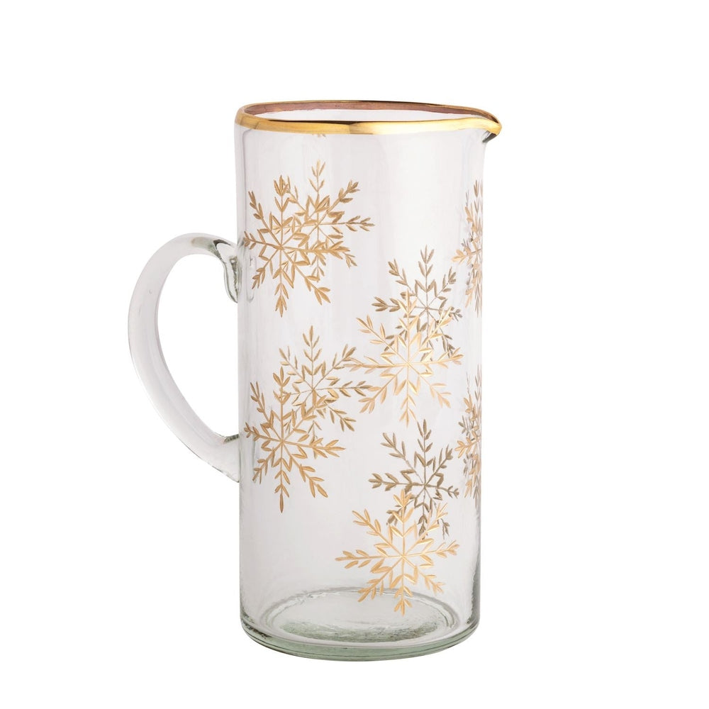 Clear glass pitcher with gold snowflakes and a gold rim