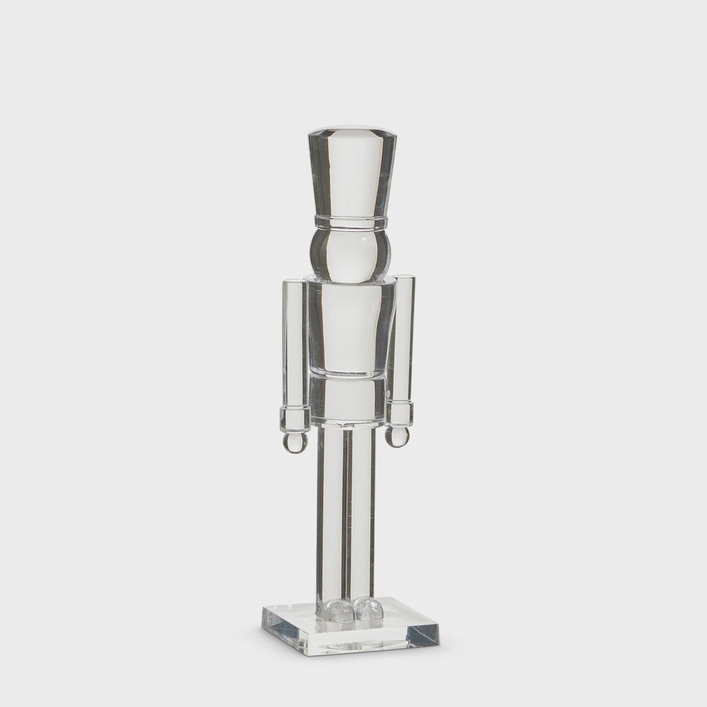 Small clear acrylic nutcracker figure on a square base