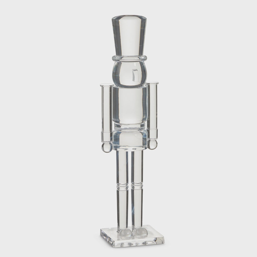 Tall clear acrylic nutcracker figure on a square base