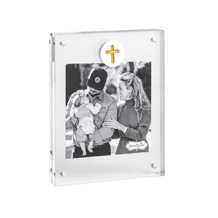 Mud Pie acrylic magnetic block frame displaying a black and white family portrait in a wooded setting featuring a textured gold dimensional cross and visible silver corner pins