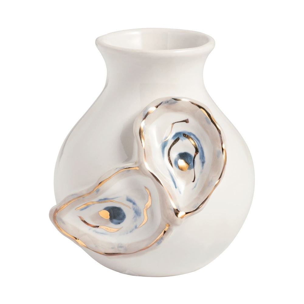 Ceramic bud vase by Grit & Grace Studio featuring two sculpted oyster shell motifs with gold gilded rims and blue watercolor interior accents against a white background