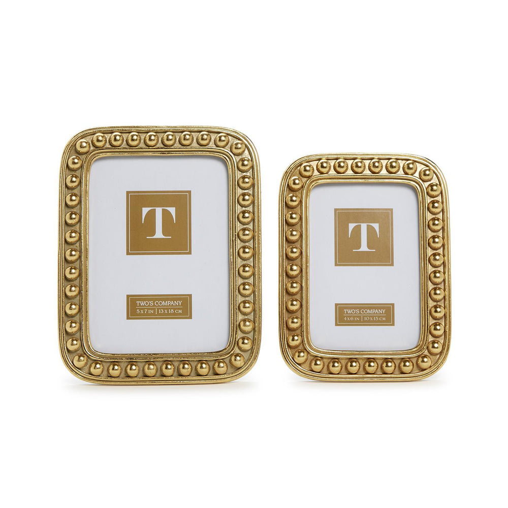 Two's Company gold metallic frames featuring a raised sphere bead border and rounded corners on a white background with 5x7 and 4x6 size inserts and a gleaming finish