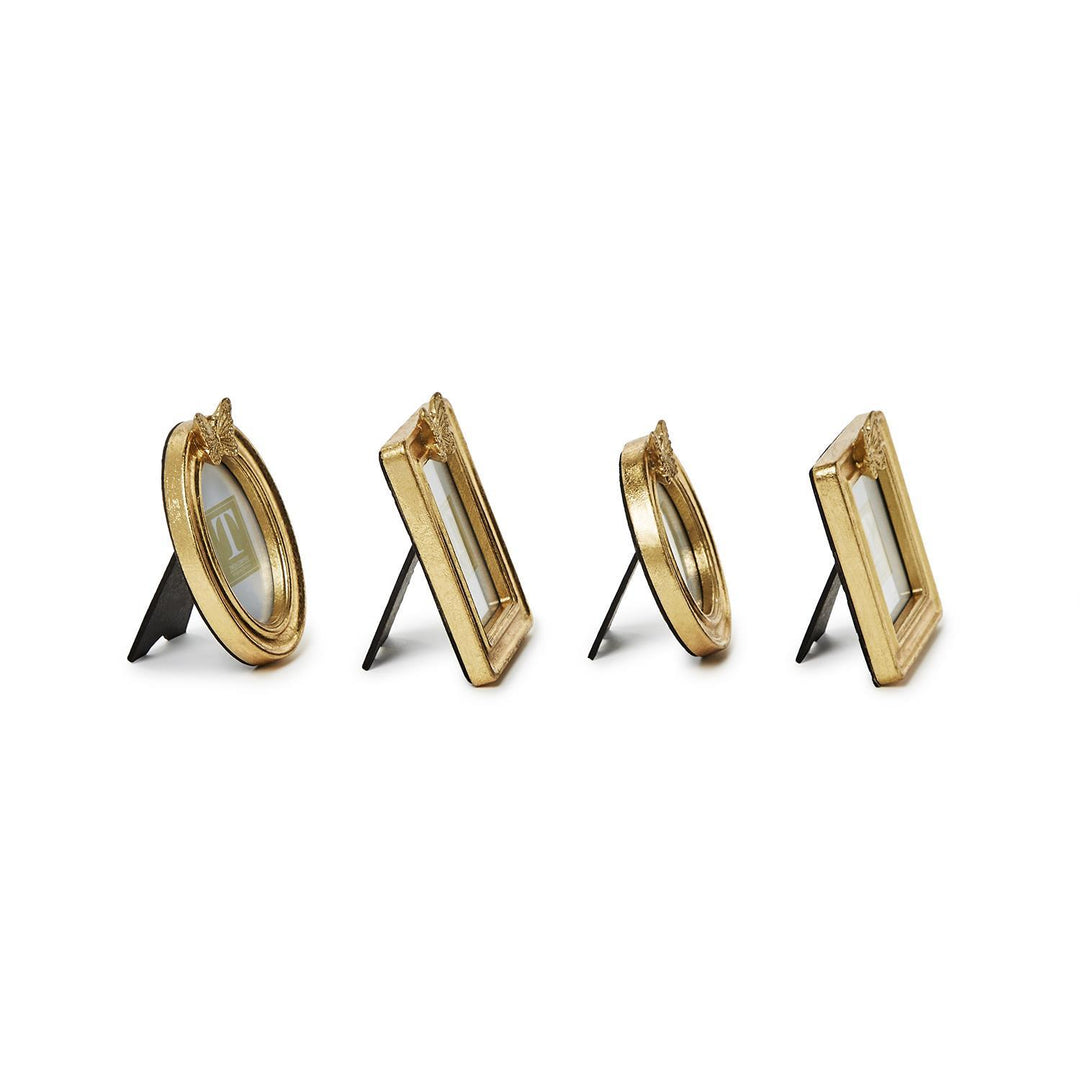 Set of four gold-finished picture frames by Two&