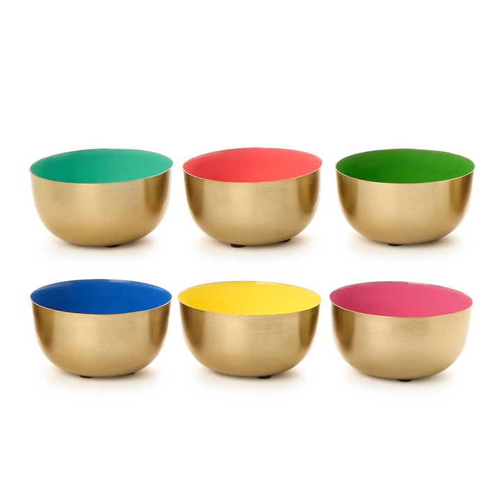 Enamel and gold-finished metal decorative bowls arranged in two rows on a white background featuring vibrant interior colors of teal, red, green, blue, yellow, and pink contrasted with a matte gold exterior finish