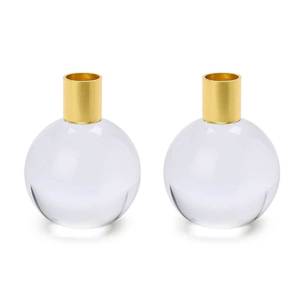 Crystal and brushed gold metal pair of contemporary spherical candle holders featuring transparent glass orbs and cylindrical gold-finished collars against a plain white background