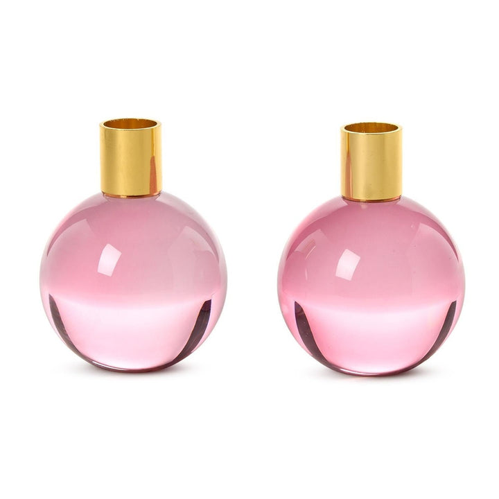Two pink glass ball taper candleholders with gold collars