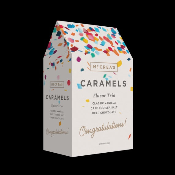McCrea's Caramels Flavor Trio gable box with confetti design and "Congratulations!" in gold script