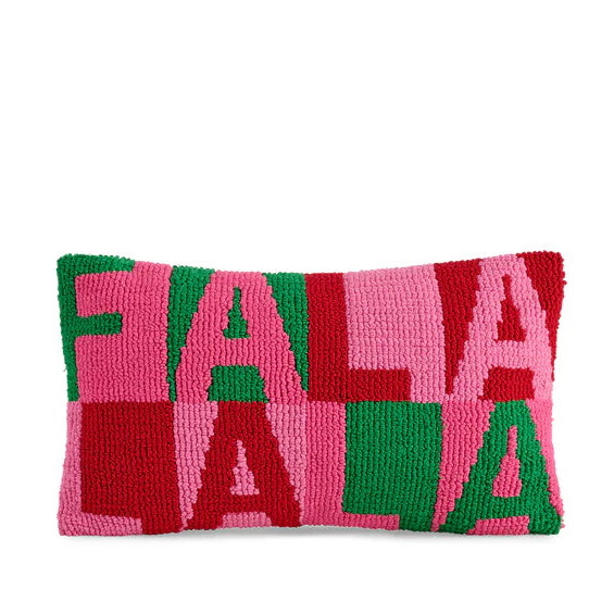 Wool loop hooked lumbar pillow featuring the festive phrase FA LA LA LA in a bold pink, red, and green color-blocked checkerboard pattern with a thick nubby texture