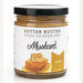 Product photograph by Sutter Buttes of a glass jar of Honey Mustard against a white background featuring the iconic brand logo, a black lid, and a colorful illustration of golden dripping honeycomb
