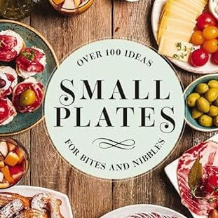 Digital photograph of a cookbook cover titled Small Plates for Bites and Nibbles on a rustic wood table surrounded by colorful appetizers including bright green olives, sliced red salami, and sugar-dusted churros