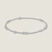 Sterling silver beaded bracelet featuring a polished reflective finish with alternating clusters of large and small spherical beads against a neutral white background