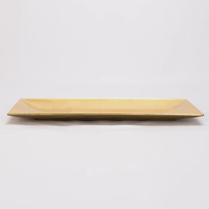 Shallow rectangular gold tray, side view