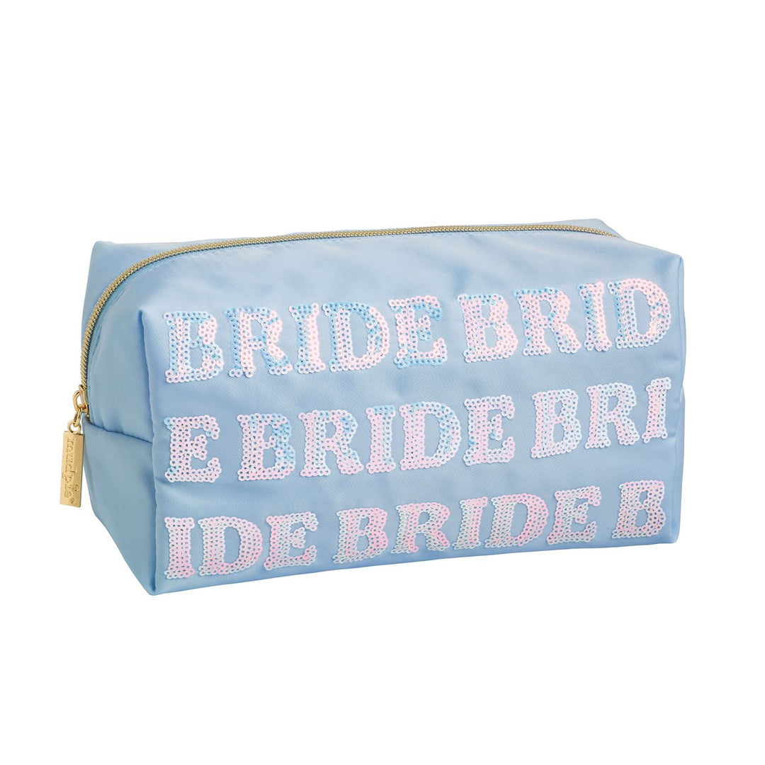 Mud Pie light blue nylon cosmetic pouch featuring repeating BRIDE text in iridescent pink and blue sequins with a gold-tone zipper and branded charm set against a plain white background