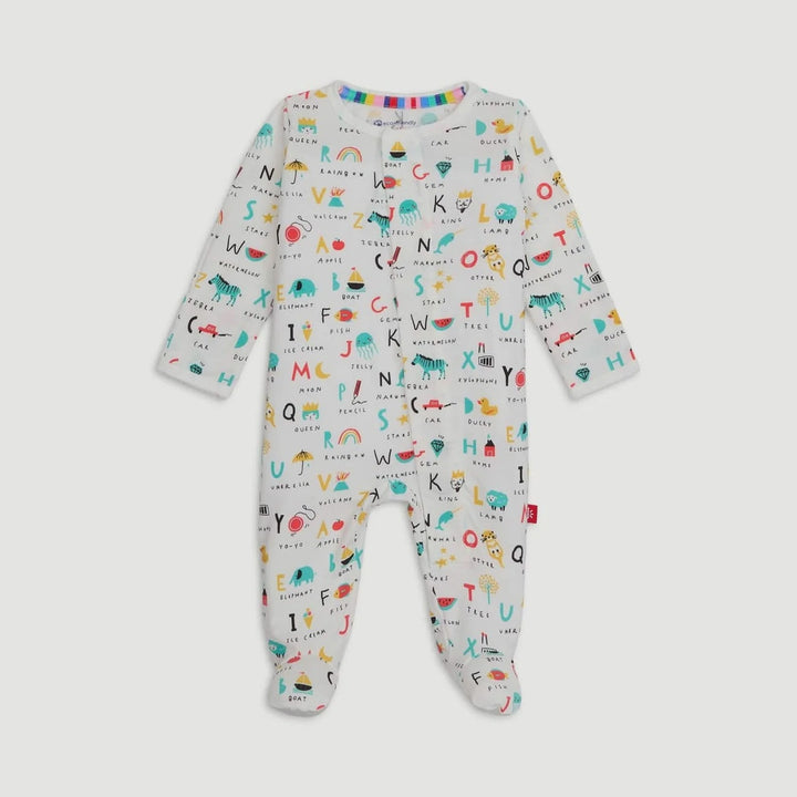 Product photograph of a white long-sleeved baby onesie with an all-over alphabet print against a gray background featuring colorful hand-drawn illustrations like a red car, a blue elephant, and a vibrant rainbow