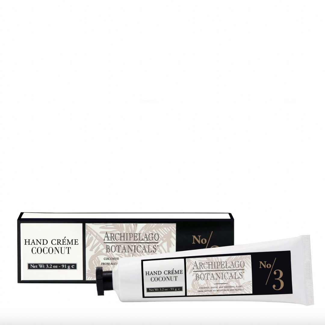 Commercial product photography of Archipelago Botanicals Coconut Hand Créme tube and box set against a white background featuring minimalist black and white branding with delicate tan palm leaf illustrations and a No/3 designation