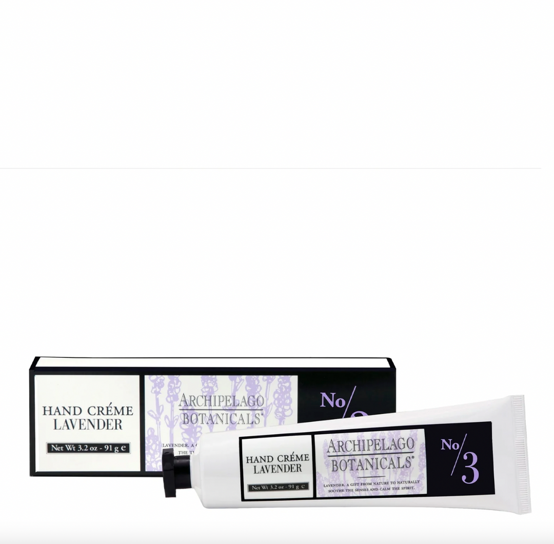 Commercial product photograph by Archipelago Botanicals of a lavender hand crème tube and box on a white background featuring delicate purple floral illustrations and a black screw cap with bold No 3 branding