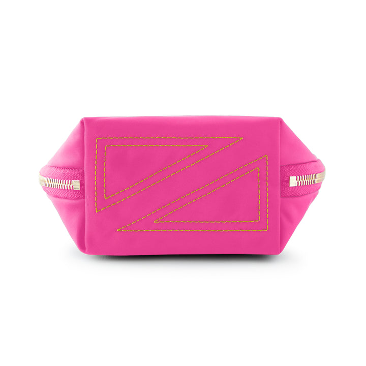 Re-Nylon cosmetics pouch by Prada featuring a vibrant hot pink fabric, iconic yellow double-triangle decorative stitching, and a metallic silver zipper against a white studio background