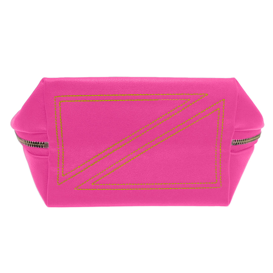 Vibrant pink leather cosmetic bag isolated on a white background featuring unique neon yellow triangular topstitching and a silver metal zipper closure