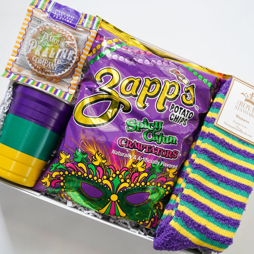 Box containing Zapp's spicy onion chips, a mask, and colorful socks on a white background