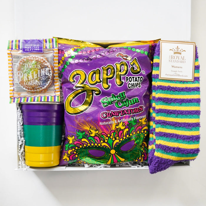 Colorful gift box with Zapp's potato chips, striped socks, and plastic cups on a white background