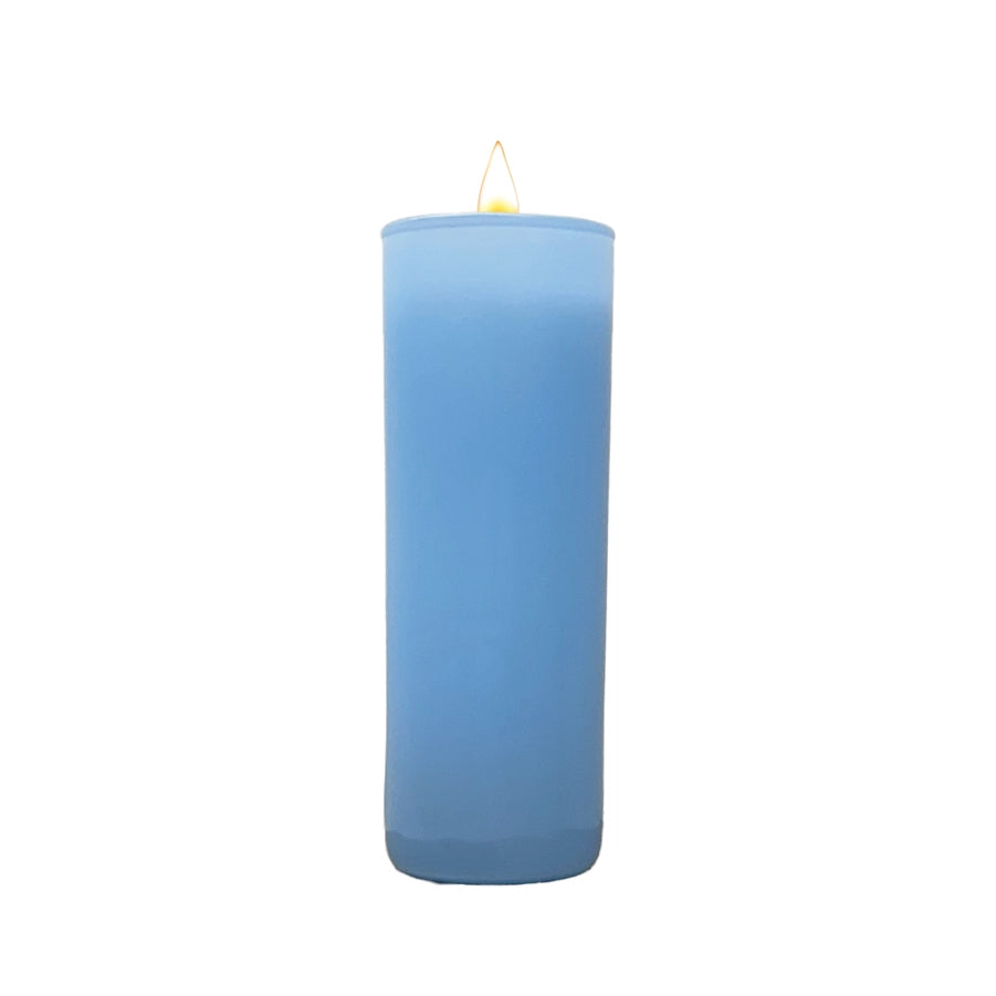Lit light blue votive candle on a white background